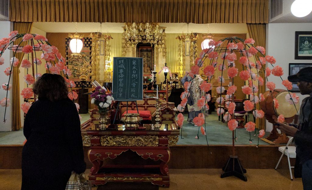 Faux cheery blossom trees decorating the Nichiren Memorial Service